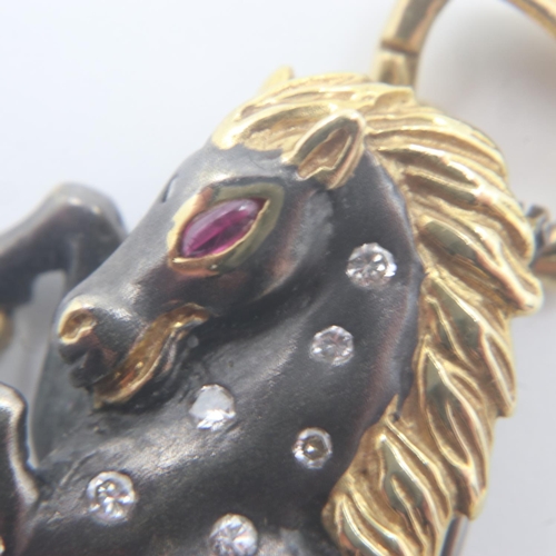 5 - 18ct gold, yellow and oxidized finish horse shaped pendant/brooch set with natural diamonds and ruby... 