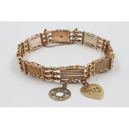 56 - Victorian 15ct gold gate bracelet, with two 9ct charms and safety chain, 22.8g. UK P&P Group 0 (£6+V... 