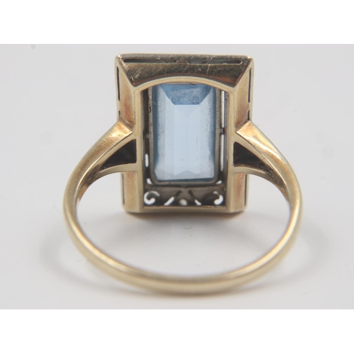 58 - 1920s cocktail ring, set with a large emerald-cut aquamarine surrounded with diamond chips, in a pla... 