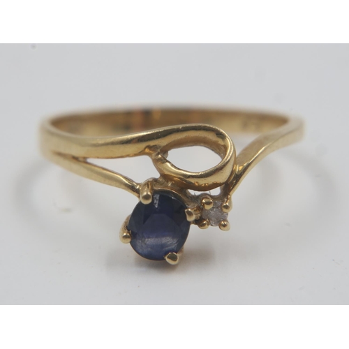 63 - Contemporary 18ct gold sapphire and diamond set ring, size L/M, 2.4g. UK P&P Group 0 (£6+VAT for the... 