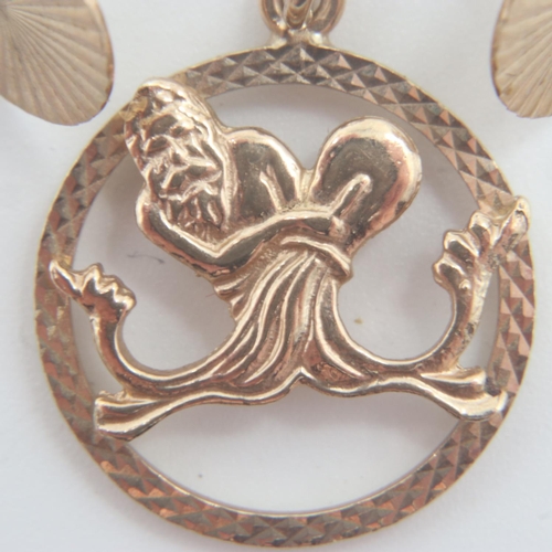 66 - 9ct gold pendant depicting Neptune wrestling an octopus and a pair of 9ct gold studs, combined 2.7g.... 