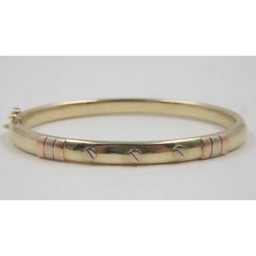 69 - 14ct gold snap bangle, with applied rose and white gold detail, 13.5g. UK P&P Group 0 (£6+VAT for th... 