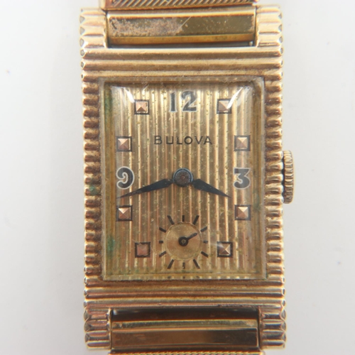 91 - 10ct filled gold Bulova gents tank style wristwatch, working at lotting up. UK P&P Group 1 (£16+VAT ... 