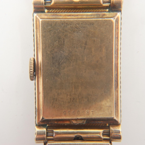 91 - 10ct filled gold Bulova gents tank style wristwatch, working at lotting up. UK P&P Group 1 (£16+VAT ... 