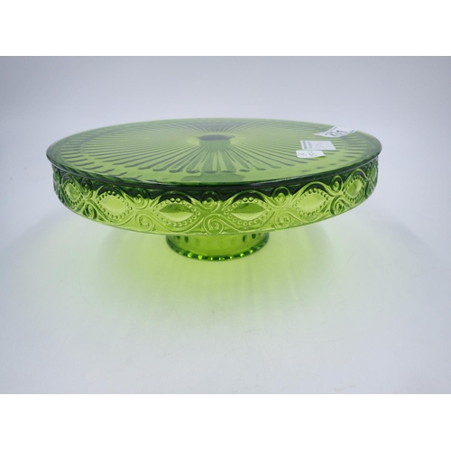 231 - Italian art glass dolphin, H: 18cm, with a green glass pedestal cakestand, D: 28cm. Not available fo... 