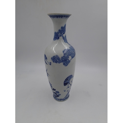 239 - Large Oriental blue and white vase decorated with storks, H: 46cm. In good order with no issues note... 