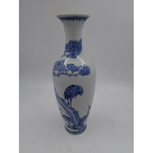 239 - Large Oriental blue and white vase decorated with storks, H: 46cm. In good order with no issues note... 