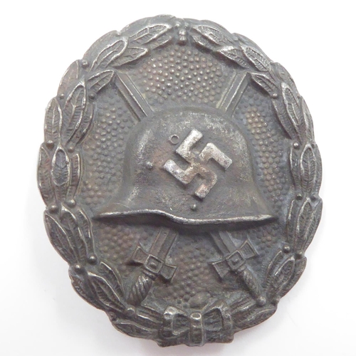 2251 - 1936 Pattern Spanish Civil War Period German Condor Legion 3rd Class Black Wound Badge (representing... 