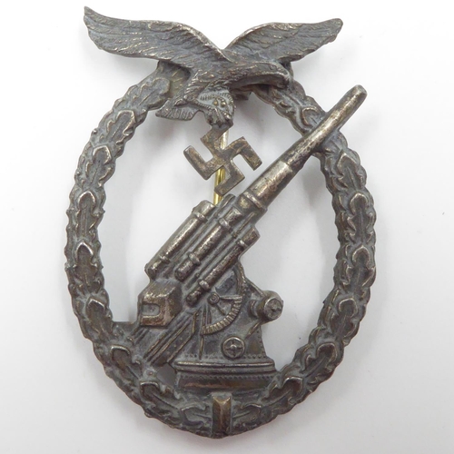 2262 - Third Reich Early War Heer (Army) Flak Artillery Badge. Nice solid heavily plated Tumbak Badge. Unma... 