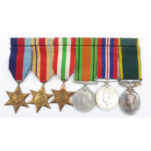 2296 - WWII British medal group, to 873875 Gunner E Kershaw Royal Artillery including George VI territorial... 