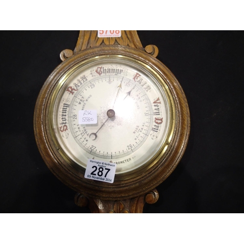 287 - Carved oak aneroid barometer, c. 1880. H: 72cm. Not available for in-house P&P