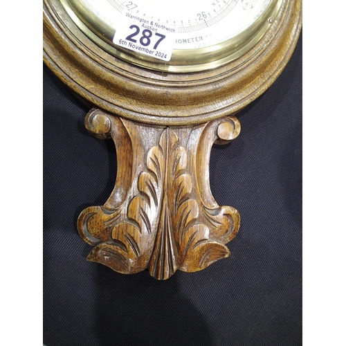 287 - Carved oak aneroid barometer, c. 1880. H: 72cm. Not available for in-house P&P