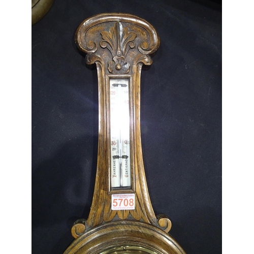 287 - Carved oak aneroid barometer, c. 1880. H: 72cm. Not available for in-house P&P