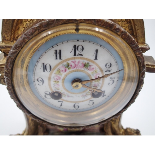 290 - French Ormolu mantel clock, with porcelain panels and finial, H: 41cm. Not available for in-house P&... 