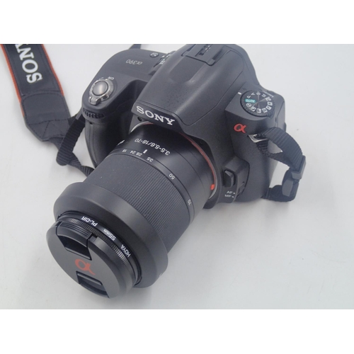 146 - Sony A390 digital SLR camera, with Minolta 62mm lens and a Sony Cybershot camera in a Lowepro soft c... 