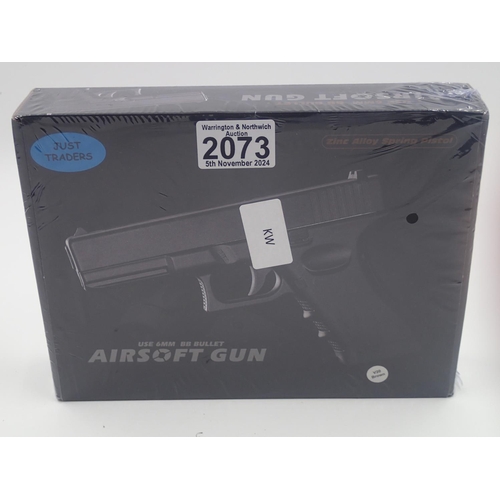 2073 - Airsoft pistol, model V20 in brown, boxed. UK P&P Group 1 (£16+VAT for the first lot and £2+VAT for ... 