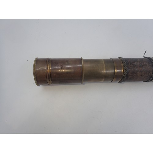 143 - Leather bound telescope, extended length 72cm. UK P&P Group 2 (£20+VAT for the first lot and £4+VAT ... 