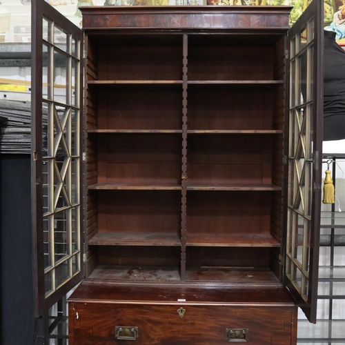 2135 - A monumental 19th century secretaire, the single fitted drawer sits on four turned supports and bene... 