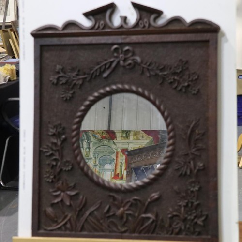 2077 - Edwardian carved and pokerwork mahogany framed wall mirror dated 1909 to its pediment, having a repl... 