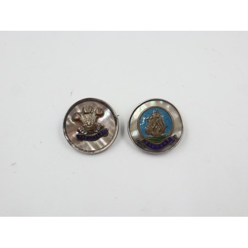 110 - Two silver rimmed mother of pearl military brooches. UK P&P Group 0 (£6+VAT for the first lot and £1... 