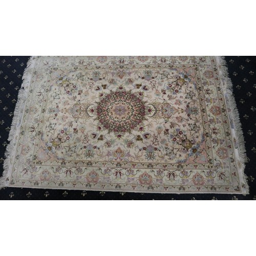 2084 - Contemporary Persian silk floor rug, fringed, decorated with garden floral designs around a central ... 