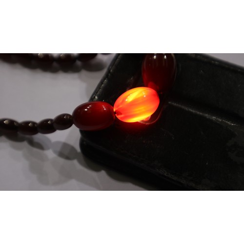 20 - Cherry amber graduated bead necklace, largest bead L: 28 mm, 39g, condition good. UK P&P Group 0 (£6... 