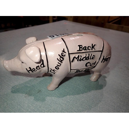 1016 - Cast iron Harrisons Hams pig bank, L: 18 cm. Not available for in-house P&P.