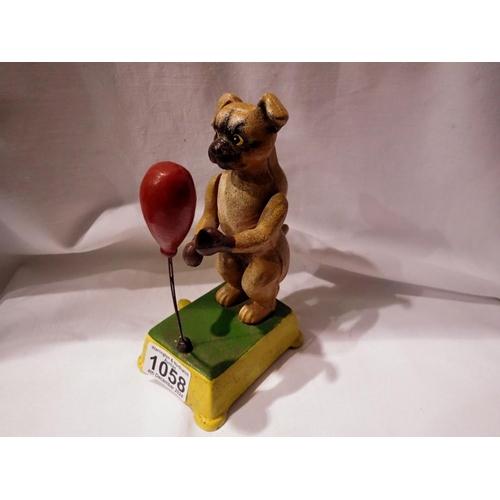 1058 - Cast iron mechanical boxing, boxer dog figure, H: 18 cm. UK P&P Group 1 (£16+VAT for the first lot a... 