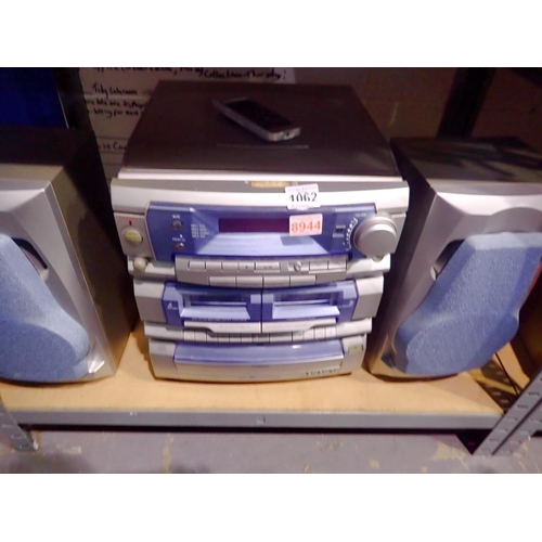 1062 - Goodmans music centre with speakers. All electrical items in this lot have been PAT tested for safet... 