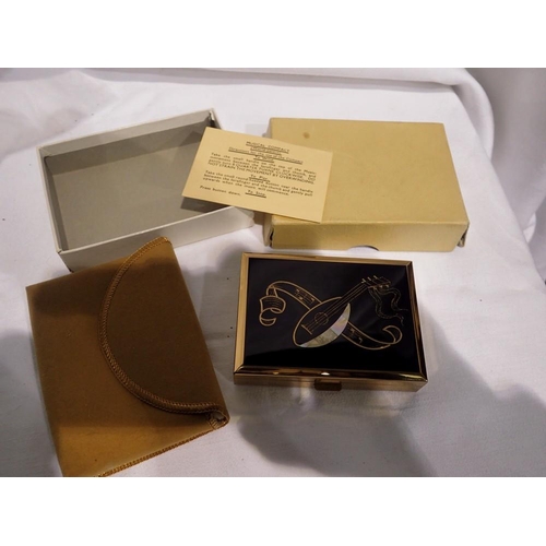 1069 - Mid-century musical compact with dustbag, instructions and original box. UK P&P Group 1 (£16+VAT for... 