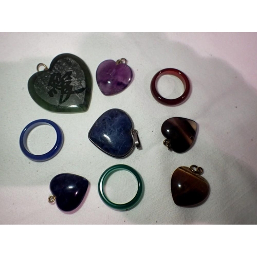 1079 - Polished hardstone pendants and rings including tigers eye, agate and amethyst. UK P&P Group 1 (£16+... 