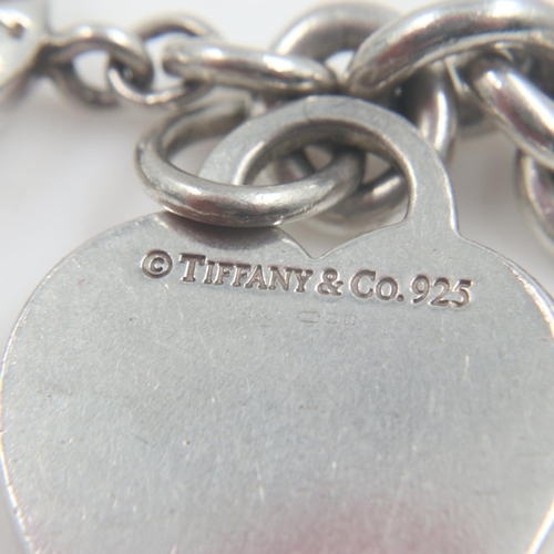 11 - Tiffany and Co 925 silver charm bracelet, 38g. UK P&P Group 0 (£6+VAT for the first lot and £1+VAT f... 