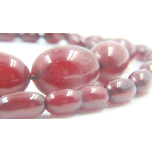 20 - Cherry amber graduated bead necklace, largest bead L: 28 mm, 39g, condition good. UK P&P Group 0 (£6... 