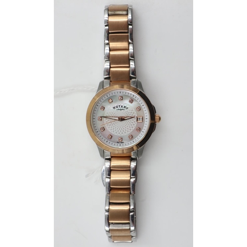 30 - ROTARY: Ladies two-tone steel cased wristwatch with stone-set chapters and date aperture, requires b... 