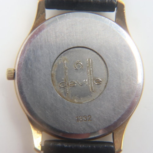 32 - OMEGA: Gents De Ville quartz wristwatch with baton chapters and date aperture, on original Omega lea... 