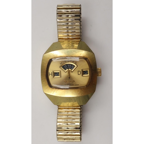 33 - SICURA: Gentleman's jump hour gold plated Swiss wristwatch, on an expanding bracelet, working at the... 