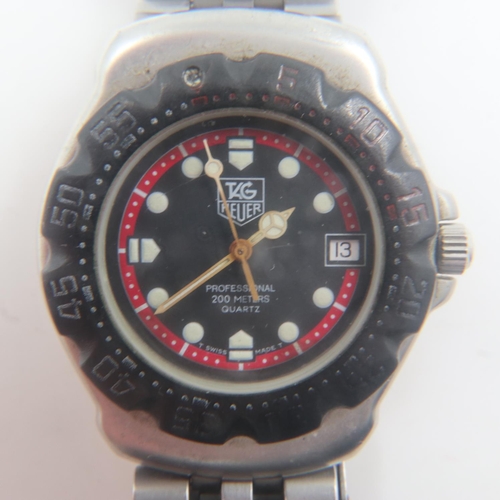 34 - TAG HEUER: Professional 200m midi quartz divers wristwatch on steel bracelet, requires battery. UK P... 