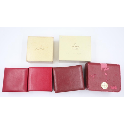 44 - OMEGA: four wristwatch boxes, two with papers and outer-card boxes, mixed conditions. UK P&P Group 2... 