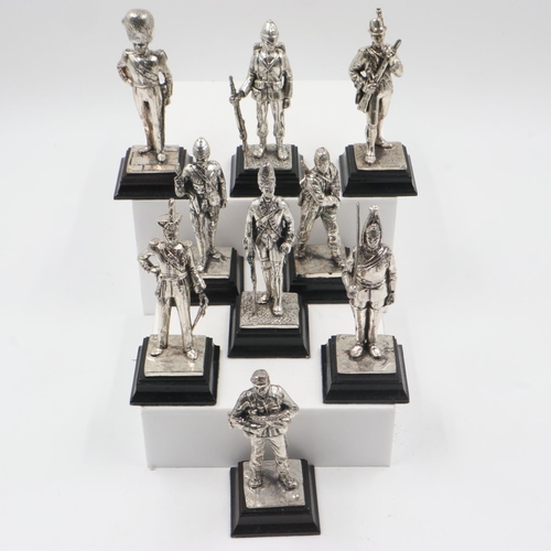 74 - Nine Royal Hampshire polished pewter military figures on wooden plinths, largest H: 12cm. UK P&P Gro... 