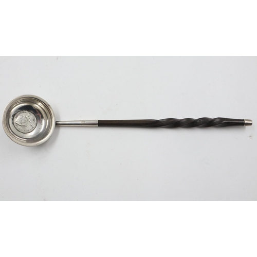 75 - Georgian silver toddy or brandy ladle with twisted and tapering whalebone handle, the bowl set with ... 