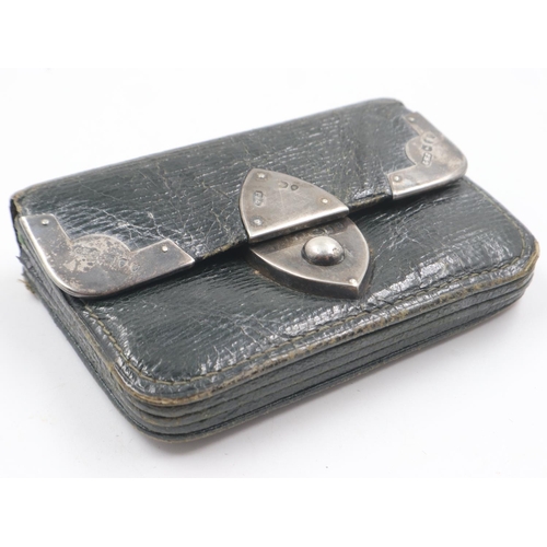 77 - Hallmarked silver mounted leather purse. UK P&P Group 1 (£16+VAT for the first lot and £2+VAT for su... 