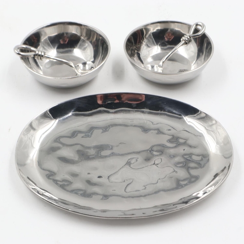 80 - Two contemporary white metal open salts with spoons on a larger dish, made by Culinary Concepts, Lon... 