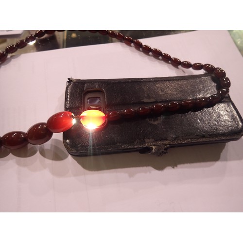 20 - Cherry amber graduated bead necklace, largest bead L: 28 mm, 39g, condition good. UK P&P Group 0 (£6... 