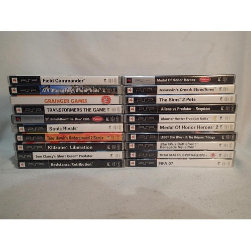 2126 - A selection of 20 cased PSP games. Games are in excellent condition and in original cases with paper... 