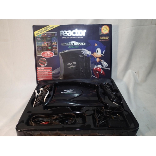 2224 - Boxed Reactor wireless gaming plug & play console. Includes 20 Sega Mega Drive games, 30 bonus games... 