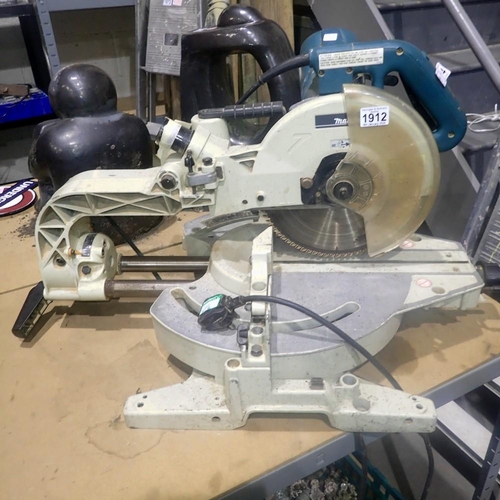 1912 - Makita LS 1013 compound 230v mitre saw. All electrical items in this lot have been PAT tested for sa... 