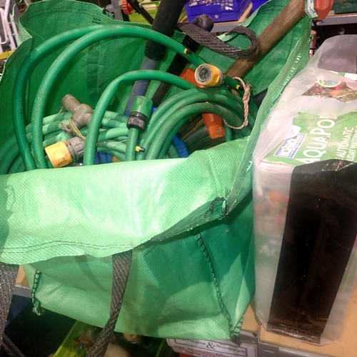 1935 - Large bag of mixed garden tools including a hose pipe. Not available for in-house P&P