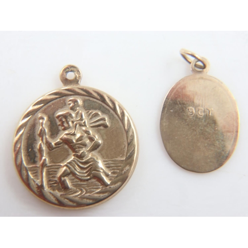 61 - Two 9ct gold St Christopher pendants/charms, combined 1.7g. UK P&P Group 0 (£6+VAT for the first lot... 