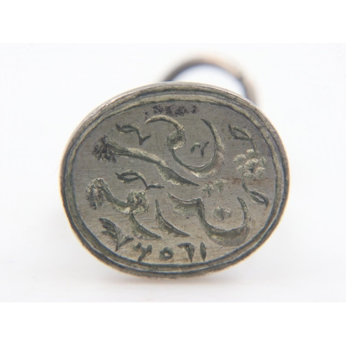 66 - Unmarked white metal antique fob seal, Arabic engraved to base, 7.0g. UK P&P Group 0 (£6+VAT for the... 