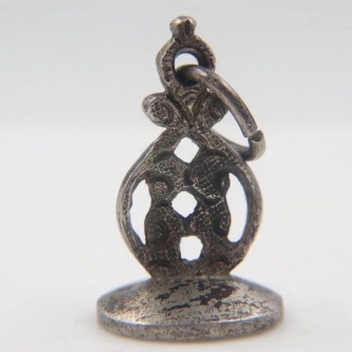 66 - Unmarked white metal antique fob seal, Arabic engraved to base, 7.0g. UK P&P Group 0 (£6+VAT for the... 